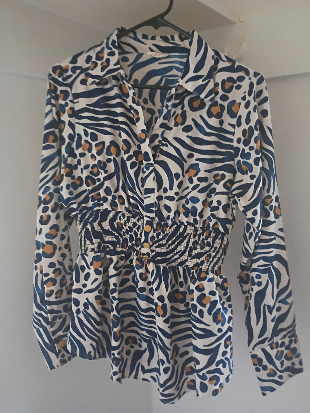 Blue and White Animal-Print Smocked-Waist Blouse with Tan Accents